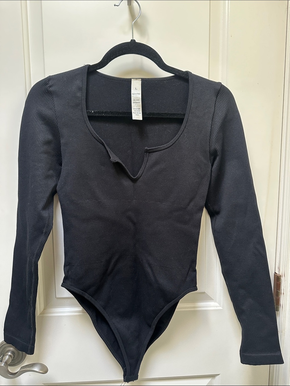 Women’s Black Long-Sleeve One-Piece Bodysuit